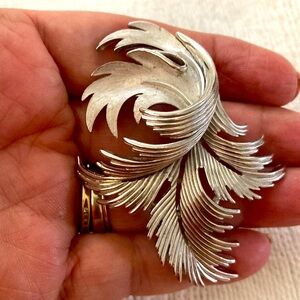 Vintage crown Trifari brooch. Slightly over 3 inches. Perfect. Sweeping scallop